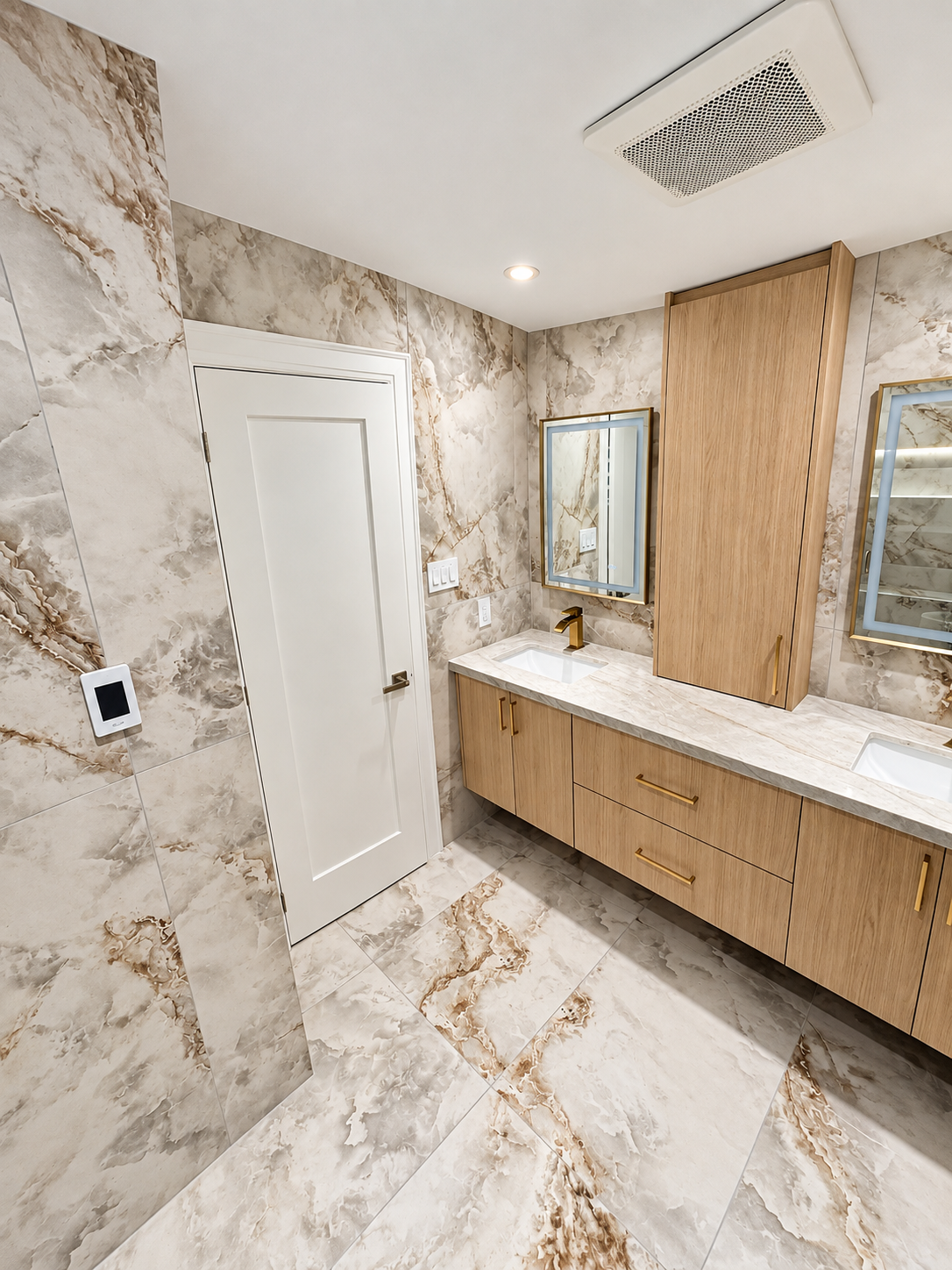 Wide view of the completed custom bathroom vanity and porcelain surfaces